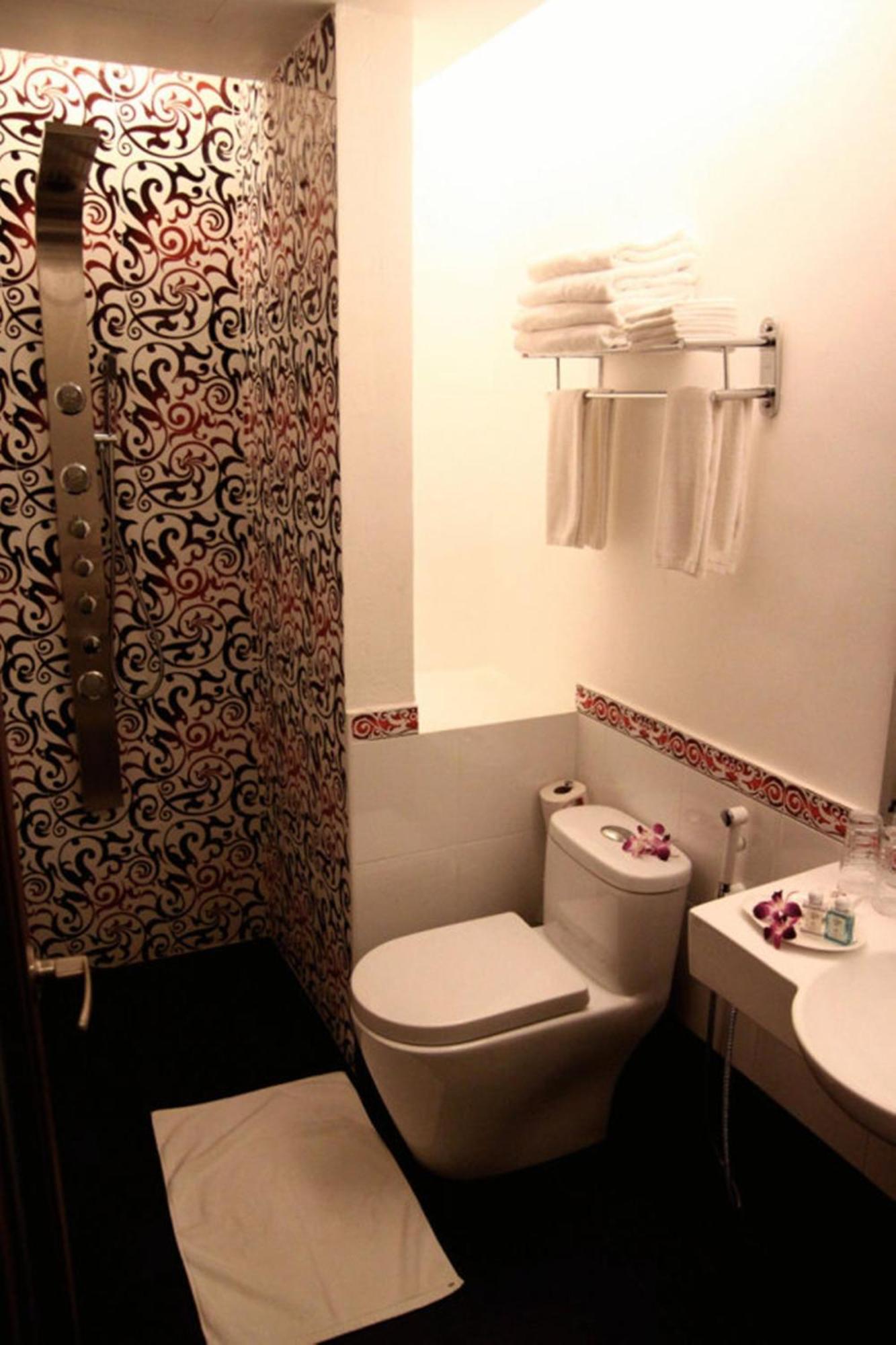 Arenaa Deluxe Hotel Малакка Номер фото